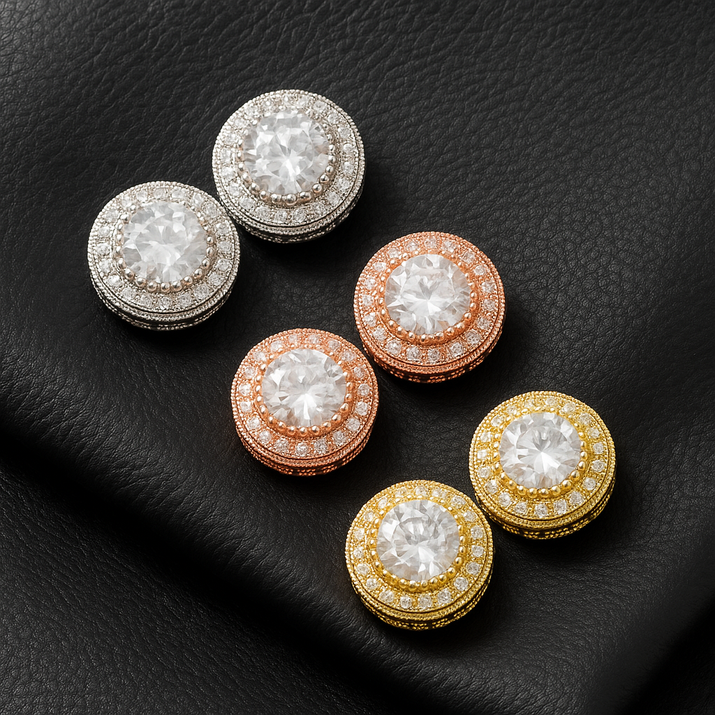 Large round earrings with a halo of stones and a gold tone.