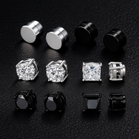 Set of multiple stud earrings in different shapes and colours, each with sparkling stones.