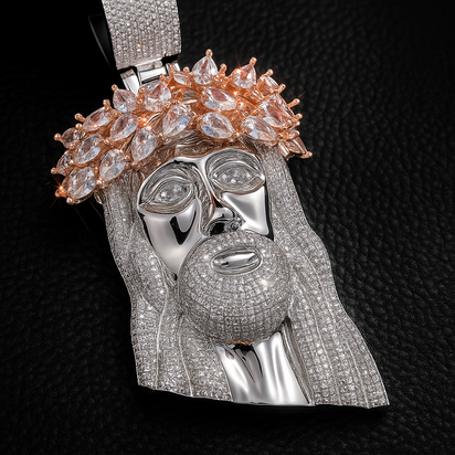 Detailed pendant shaped like Jesus’ head with a crown of thorns encrusted in stones.