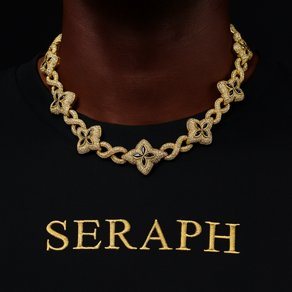 Necklace featuring interlocking infinity symbols and four leaf clover motifs covered in stones.
