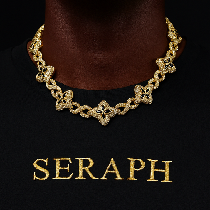 Necklace featuring interlocking infinity symbols and four leaf clover motifs covered in stones.