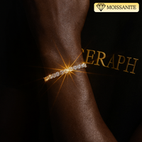 Close‑up of a tennis bracelet featuring moissanite stones on silver links.